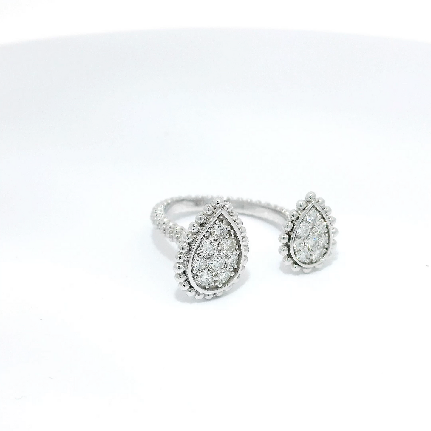 Diamond Encased in Beaded Halo Between-Finger Ring in 18K White Gold