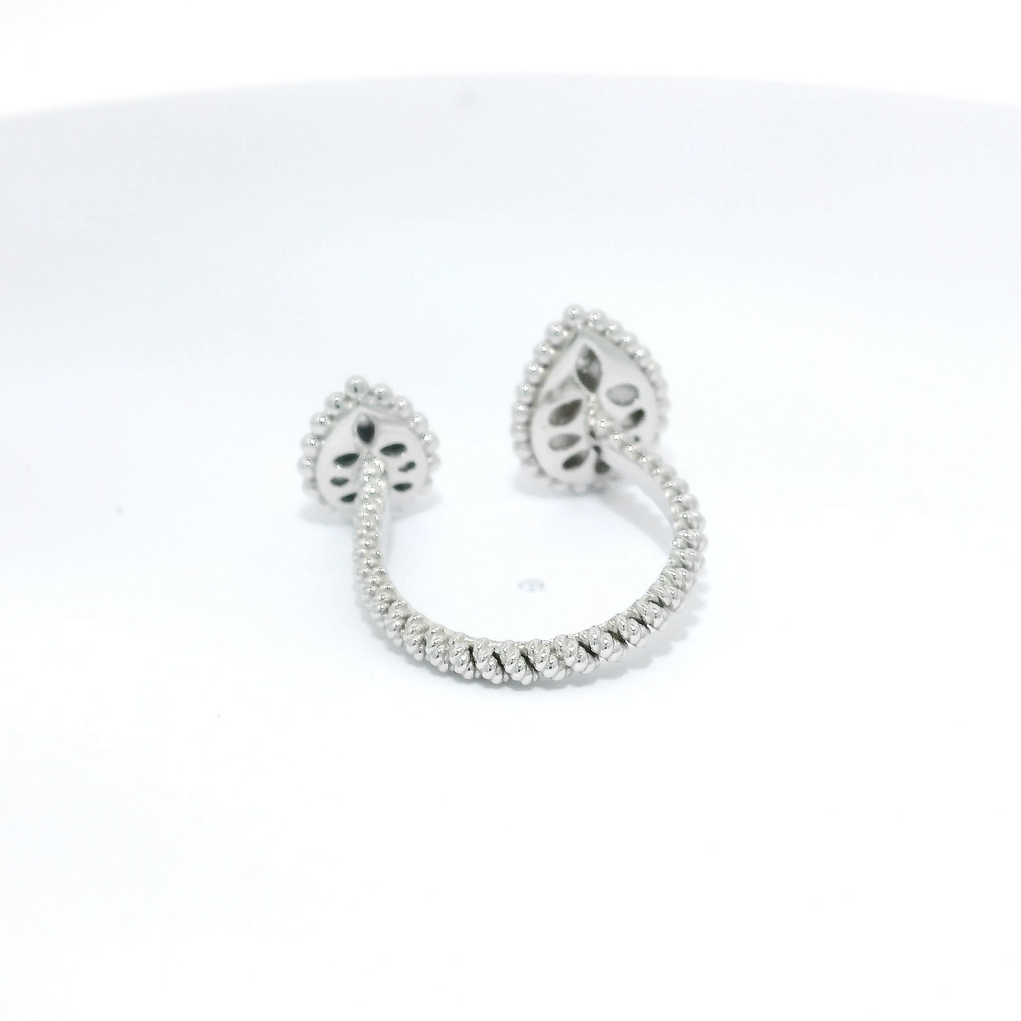 Diamond Encased in Beaded Halo Between-Finger Ring in 18K White Gold